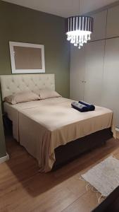 Postel nebo postele na pokoji v ubytování Duplex - Unidade Jardins