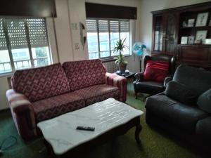 Χώρος καθιστικού στο Casa albergue Pty
