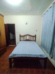 Giường trong phòng chung tại De familia para familia