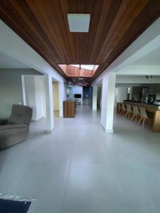 Et opholdsområde på Casa grande com jardim + 15 billeder