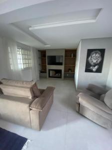 Et opholdsområde på Casa grande com jardim