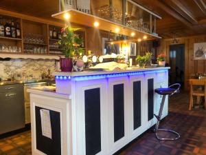 Lounge nebo bar v ubytování Auberge de l'Ange
