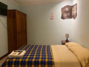 Postel nebo postele na pokoji v ubytování Posada Todos Santos