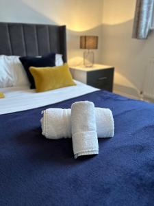 Postel nebo postele na pokoji v ubytování The Heathers - Spacious 3 Bed, Home from Home in Burton