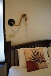 Ένα ή περισσότερα κρεβάτια σε δωμάτιο στο Naraya Resort +34 φωτογραφίες