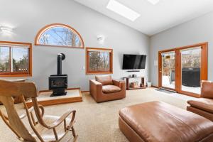 a living room with a couch and a fireplace at 1101 Mesa Drive: 2 in Silverthorne