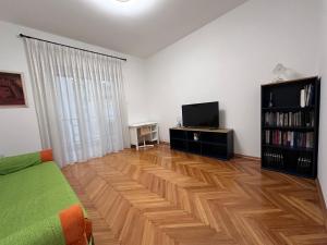 TV a/nebo společenská místnost v ubytování Novella City Home