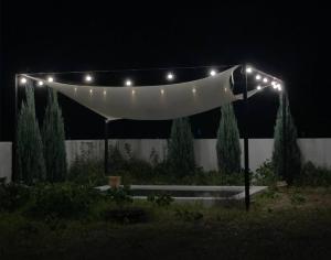 a lit up tent with lights on it at night at Stay Jirisan Ahchim in Masal-li