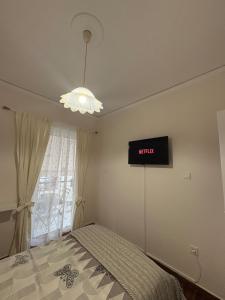 Postel nebo postele na pokoji v ubytování Apartment near Mikrolimano