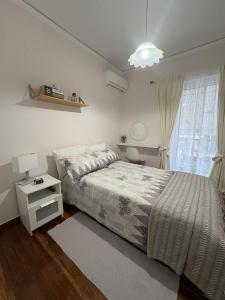 Postel nebo postele na pokoji v ubytování Apartment near Mikrolimano