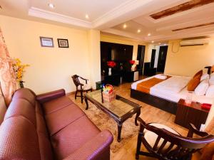 Voodi või voodid majutusasutuse The Reo Lodge, Haridwar toas
