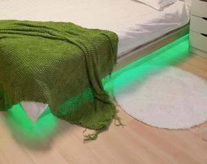 Postel nebo postele na pokoji v ubytování ManOku