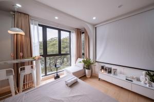 Postel nebo postele na pokoji v ubytování Aimee House Homestay Trấn Vũ