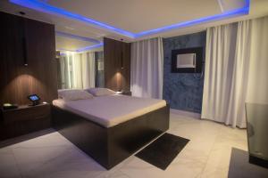 Katil atau katil-katil dalam bilik di Motel Caricia (Adult Only) +33 gambar
