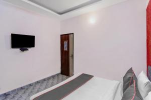 TV a/nebo společenská místnost v ubytování Hotel O One Plus One Residency