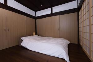 MEMORY GATEWAY HOTEL 101 Katayamatei客房内的一张或多张床位