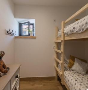 Postel nebo postele na pokoji v ubytování Gite l 'Eternelle
