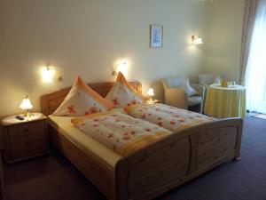 מיטה או מיטות בחדר ב-Haus Reitz
