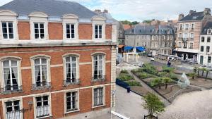 an aerial view of a brick building in a city at HYPER CENTRE COSY DUPLEX dans les remparts in Boulogne-sur-Mer