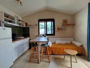 Kuchyň nebo kuchyňský kout v ubytování Bungalow Ti kaz Misouk classé 2 Etoiles