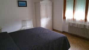 Postel nebo postele na pokoji v ubytování Albergo Sonia