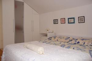 Postel nebo postele na pokoji v ubytování Apartment Hedera A14