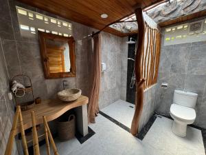 Koupelna v ubytování Ringsun Homestay Uluwatu