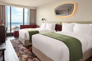 Postel nebo postele na pokoji v ubytování Hotel Indigo Auckland by IHG