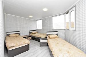 Postel nebo postele na pokoji v ubytování Canyon Hostel City Center + 22 fotografií
