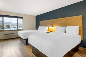 Postel nebo postele na pokoji v ubytování Columbia River Hotel, Ascend Hotel Collection