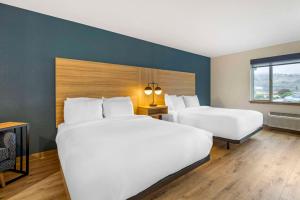 Postel nebo postele na pokoji v ubytování Columbia River Hotel, Ascend Hotel Collection