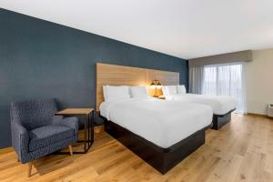 Postel nebo postele na pokoji v ubytování Columbia River Hotel, Ascend Hotel Collection