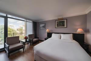 Postel nebo postele na pokoji v ubytování La Passion Classic Hotel + 37 fotografií