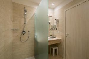 Koupelna v ubytování Hotel Executive
