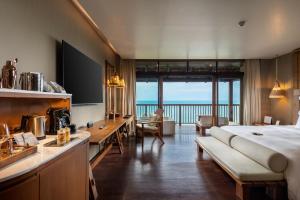 Postel nebo postele na pokoji v ubytování Silavadee Pool Spa Resort - SHA Extra Plus
