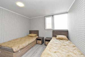 Voodi või voodid majutusasutuse Canyon Hostel City Center toas