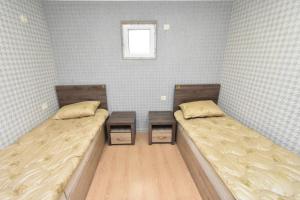 Voodi või voodid majutusasutuse Canyon Hostel City Center toas