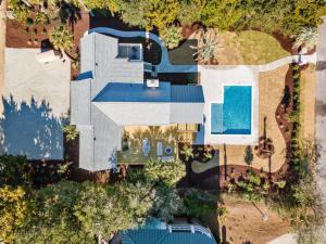 an overhead view of a house with a swimming pool at High Seas in DeBordieu Colony home by Peace Vacations in Georgetown