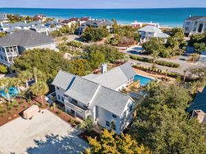 an aerial view of a home with the ocean in the background at High Seas in DeBordieu Colony home by Peace Vacations in Georgetown