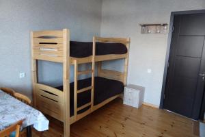 Letto o letti in una camera di Family Hotel 7 Sisters