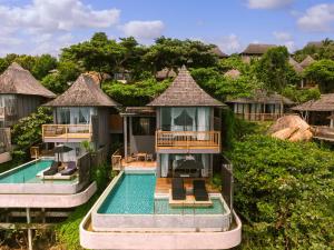 Bazén v ubytování Silavadee Pool Spa Resort - SHA Extra Plus nebo v jeho okolí