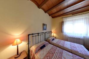 Postel nebo postele na pokoji v ubytování Casa Rural Las Tejas - Ideal para Familias y Grupos