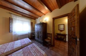 Postel nebo postele na pokoji v ubytování Casa Rural Las Tejas - Ideal para Familias y Grupos