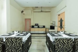 Kuchyň nebo kuchyňský kout v ubytování Hotel Sunstar Residency