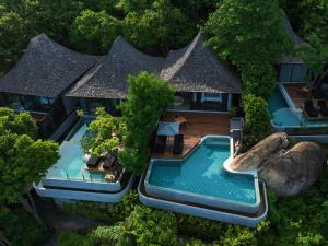 Bazén v ubytování Silavadee Pool Spa Resort - SHA Extra Plus nebo v jeho okolí