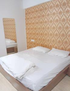 Postel nebo postele na pokoji v ubytování Hotel O Shubkamna