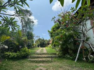 Zahrada ubytování Ringsun Homestay Uluwatu