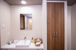 Koupelna v ubytování Hotel Umenoyu