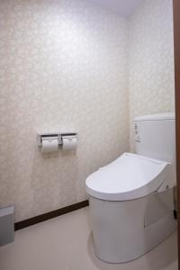 Koupelna v ubytování Hotel Umenoyu