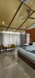 Ένα ή περισσότερα κρεβάτια σε δωμάτιο στο Vila's Club Resort